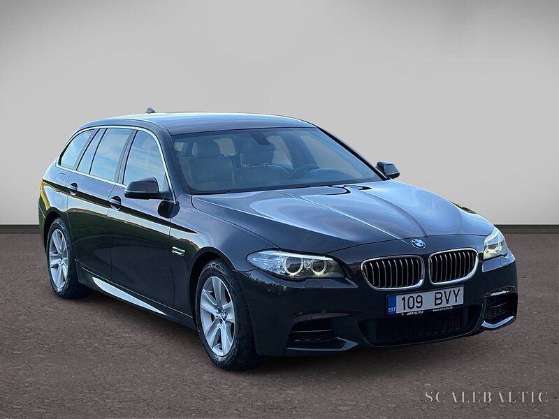 BMW 520d farmari, ruskea metalliväri, etuviisto oikealta